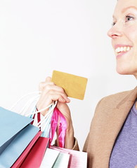 woman enjoying shopping with a credit card