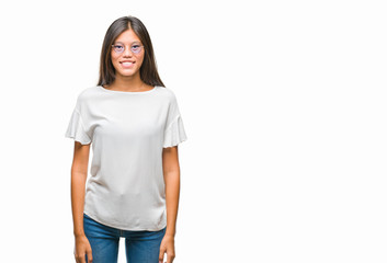 Obraz premium Young asian woman wearing glasses over isolated background with a happy and cool smile on face. Lucky person.
