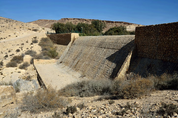 Tel-Yeruham Dam or Yeruham Dam is a masonry dam situated on the Revivim Stream, a tributary of the HaBesor Stream, in Yeruham, Southern District, Israel