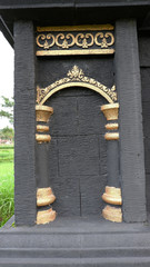 gate fence, from black stone carved