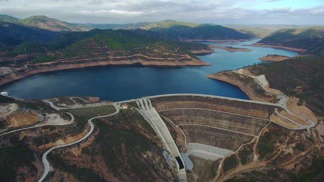 Aerial. Portuguese hydroelectro dam Odelouca, in mountains of Monchique. Algarve Portugal