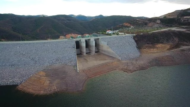 Aerial. Portuguese hydroelectro dam Odelouca, in mountains of Monchique. Algarve Portugal