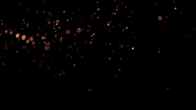 Golden Ascending Glowing Particles with Light Rays Motion Graphic Background