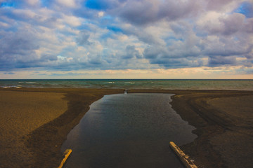 Beach. Beach of Estepona in front of the sunset. Malaga province, Andalusia, Spain.