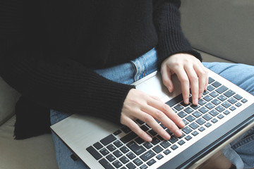 girls hands working with laptop