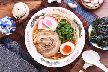 Traditional Japanese ramen withmiso based soup, sliced pork, sliced egg and green onion 
