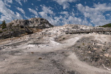 Mammoth Hot Springs is a large complex of hot springs on a hill of travertine in Yellowstone National Park. Wyoming, USA