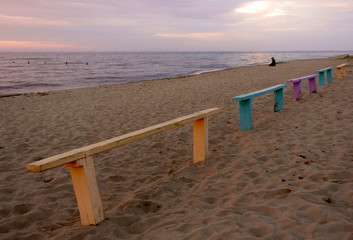 Colorful benches on the lake shore