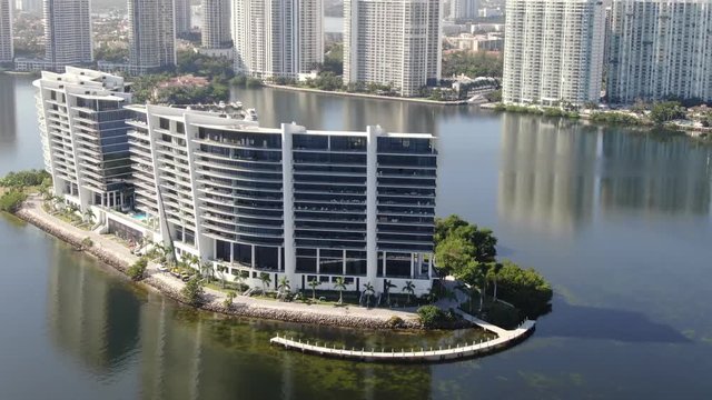Aerial of buildings and sights in Miami, Florida. Includes shots of Prive Island near Aventura, Golden Beach and Sunny Isles.