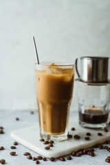 Vietnamese coffee on concrete background.