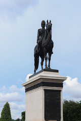 The Equestrian Statue of King Chulalongkorn with blue sky.