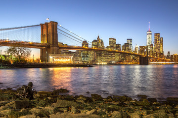 Brooklyn bridge and New York City at sunset