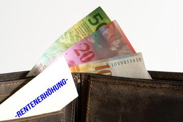 Eine Geldbörse, Banknoten Schweizer Franken und Rentenerhöhung in der Schweiz