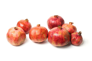 Pomegranates on the white background