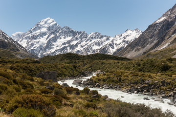 Looking up the Hooker Valley to Mount Cook with the Hooker River in the foreground. Aoraki/Mount Cook National Park, New Zealand.