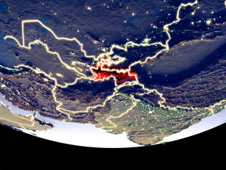 Satellite view of Tajikistan from space at night. Beautifully detailed plastic planet surface with visible city lights.