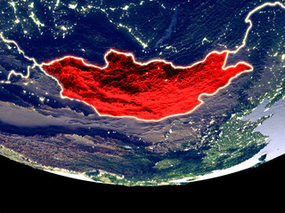 Satellite view of Mongolia from space at night. Beautifully detailed plastic planet surface with visible city lights.