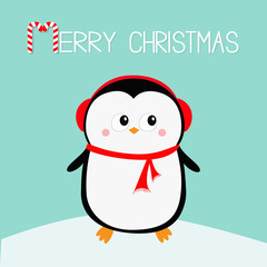 Merry Christmas. Penguin on snowdrift. Red headphones hat. Happy New Year. Cute cartoon kawaii baby character. Arctic animal. Flat design. Hello winter. Blue background.