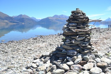stacks of stone near water