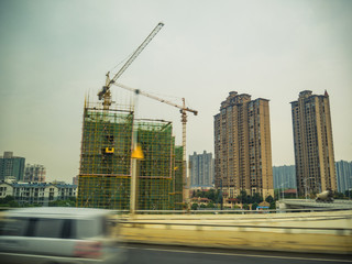 Changsha cityscape view from the bus with the motion of the car on the Highway road.Chang sha city china travel