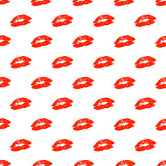 Vector seamless pattern with real red lips silhouettes.