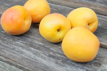 natural, organic apricot on a wooden background