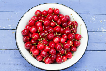 natural organic cherry on wooden background