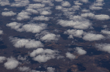 Flying above the clouds. View from the airplane, soft focus. 