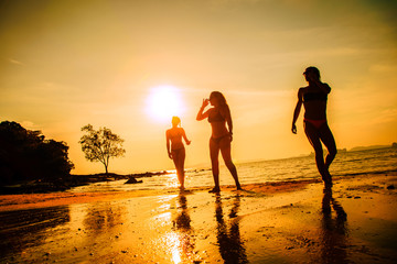 Three woman at the beach