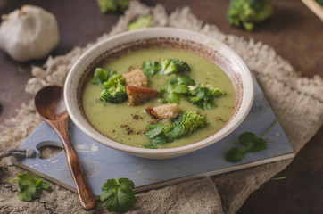 Homemade broccoli soup, fresh vegetable in and crispy croutons