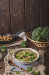 Homemade broccoli soup, fresh vegetable in and crispy croutons