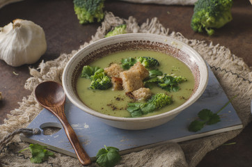 Homemade broccoli soup, fresh vegetable in and crispy croutons