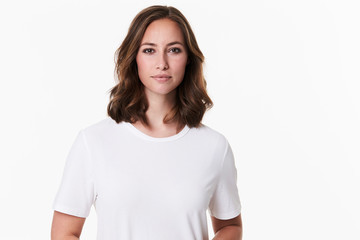 Fototapeta premium Beautiful brunette in white t-shirt, portrait