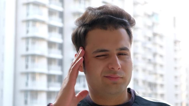 Man thinks and rejects a bad idea and mocks the person off camera with condescending hand gestures 