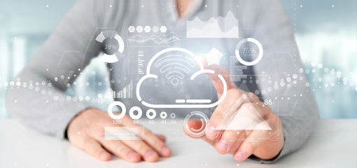 Businessman holding Cloud and wifi concept with icon, stats and data 3d rendering