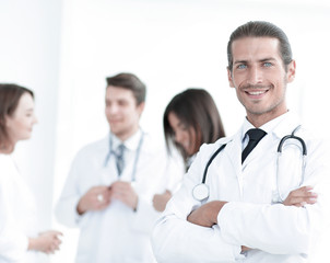 Fototapeta premium smiling doctor therapist on blurred background.