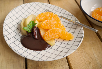 poached apples & fresh oranges with chocolate sauce/OLYMPUS DIGITAL CAMERA