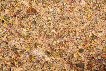 Wall of concrete with stones