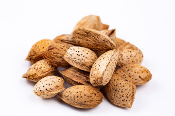 Almond oil on the white background. 