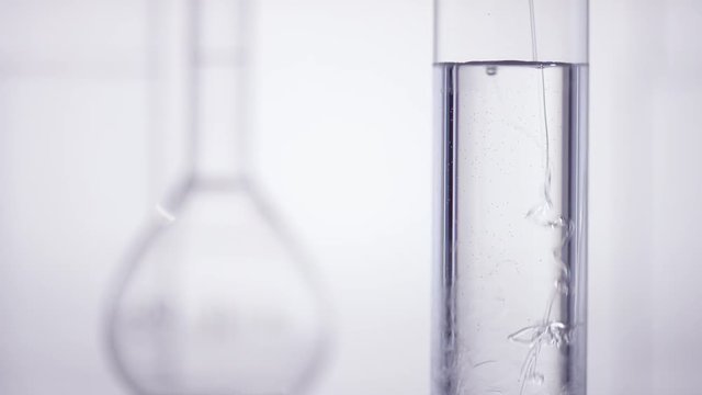 test tube get filled with viscous liqud