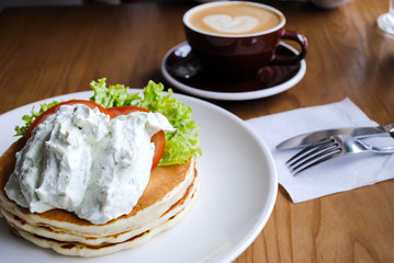 Pancakes and a cup of coffee