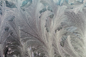 Abstract frosty pattern on glass, snow texture.