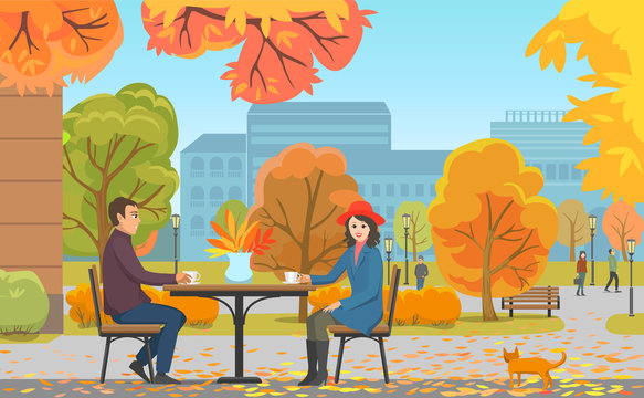 Autumn Park and Couple Drinking Coffee near Cafe