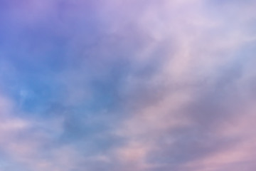 Beautiful pink clouds on the blue sky. Pastel of sky and soft cloud abstract background.