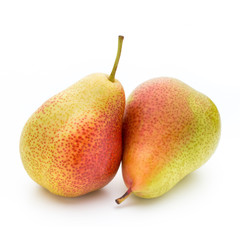 Fresh bio pear with leaves on isolated white background.