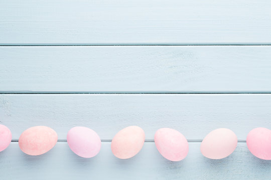 Pastel Easter eggs background. Spring greating card.