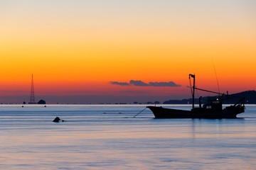 Anchored sea fishing boat.  sunset and fishing boat.  korea west sea. Ganghwa-gun, Incheon, Republic of Korea.