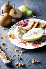 Healthy breakfast plate with pear