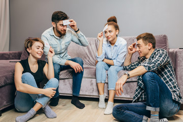 students are playing games while resting in the bedroom. closeup shot. amazement. lifestyle. leisure time