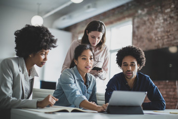 Businesspeople working in office